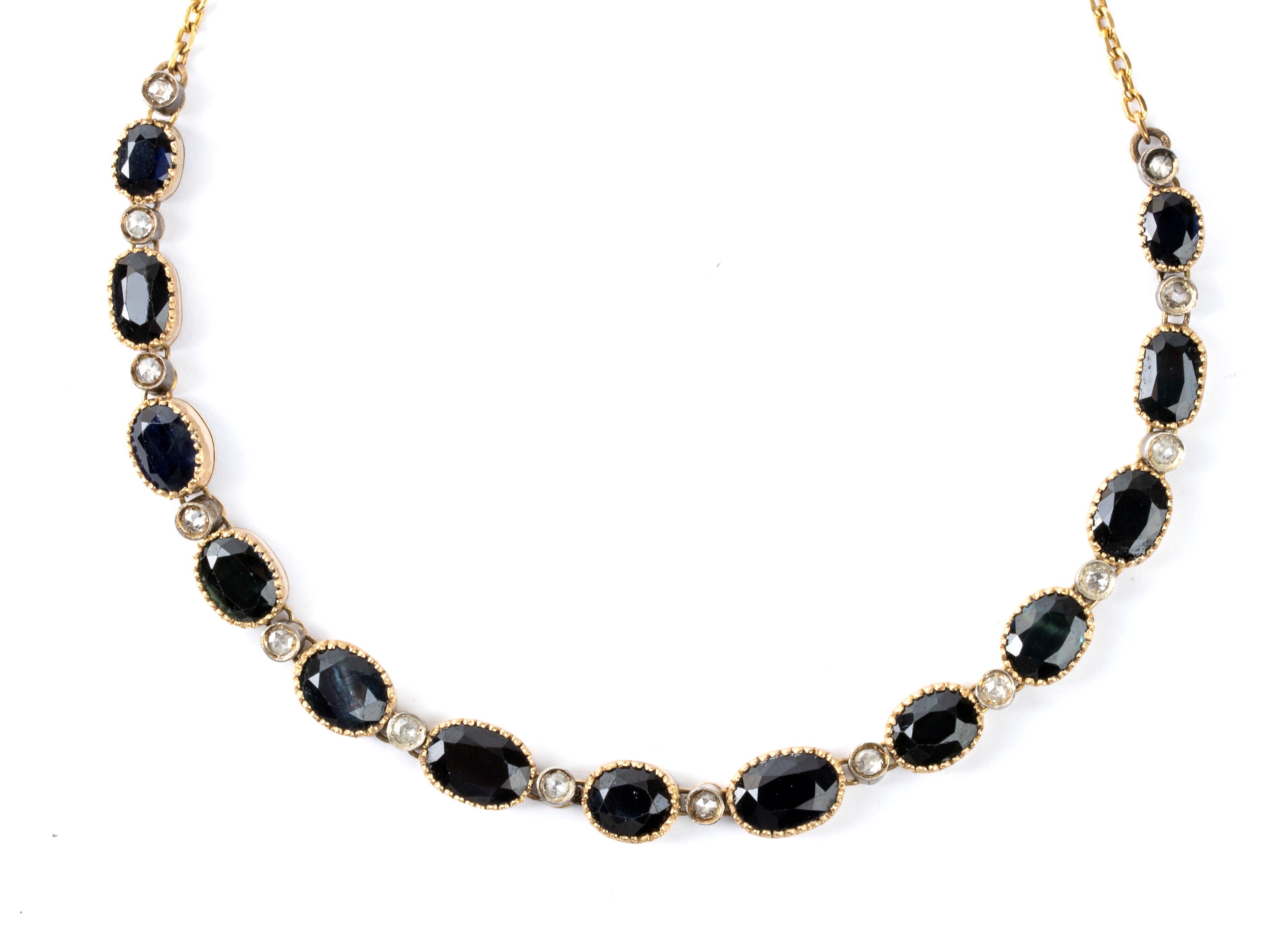 Collana e spilla-pendente, girocollo in oro e argento con zaffiri e diamanti