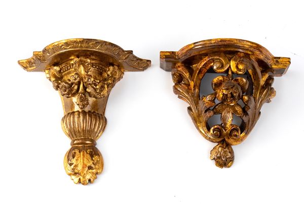 Two Louis XVI gilded corbels