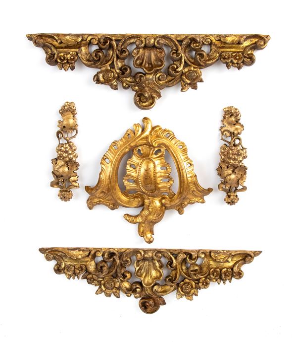 A group of Italian Louis XVI carved and gilded friezes 