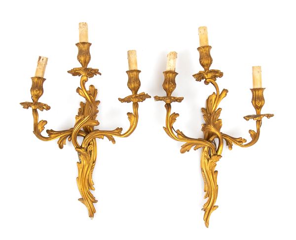 A pair of French gilded bronze wall sconces, Louis XVI style