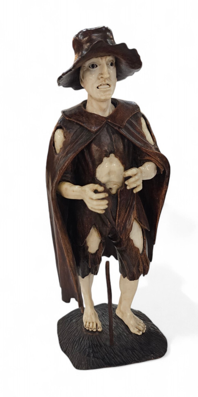 Coppia di mendicanti in legno e avorio