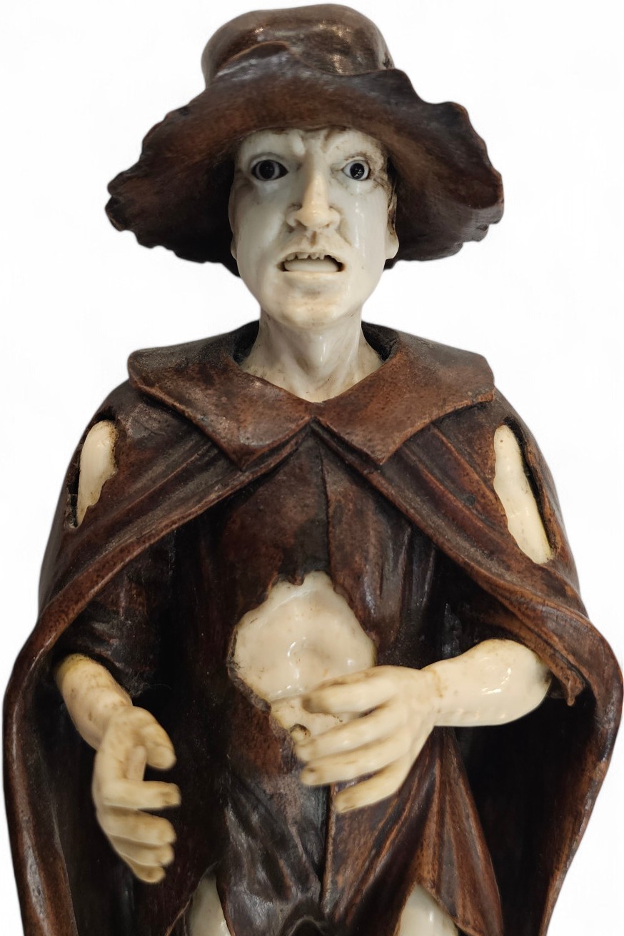 Coppia di mendicanti in legno e avorio