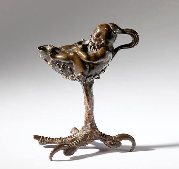 Andrea Briosco detto Riccio - Dwarf-shaped lamp on a bird of prey&#39;s leg