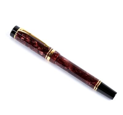 Penna stilografica in resina rossa con pennino in oro 18k