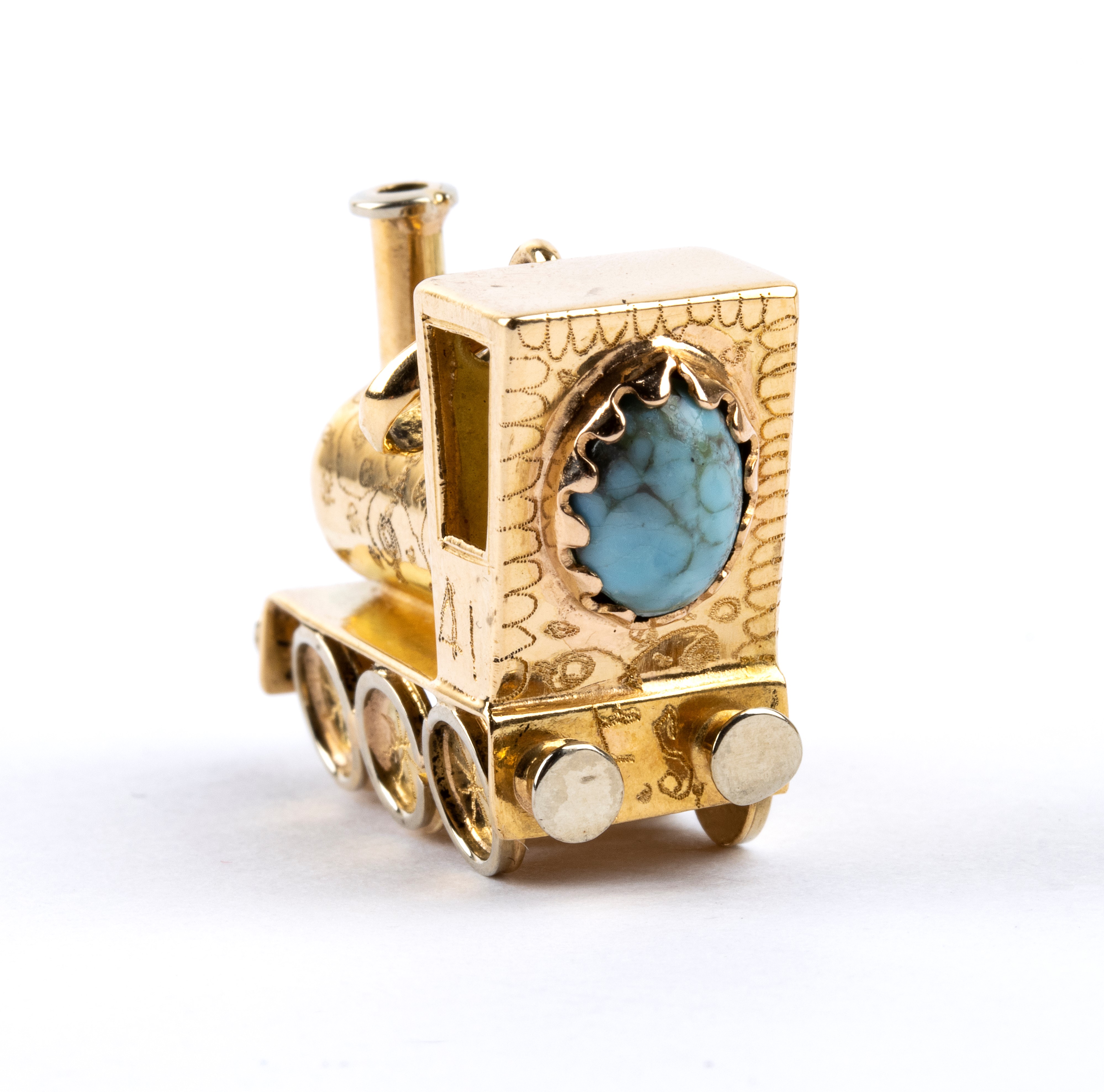 Coppia di pendenti in oro e pietre