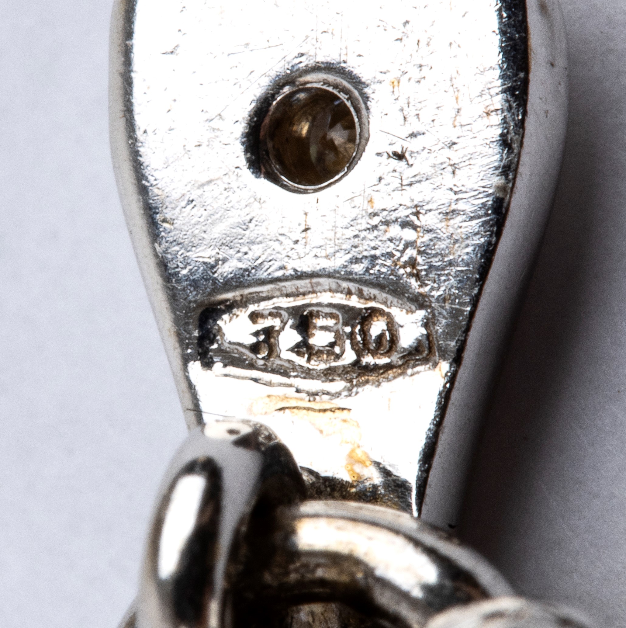 Gemelli in oro bianco 18k a forma di cane con diamanti
