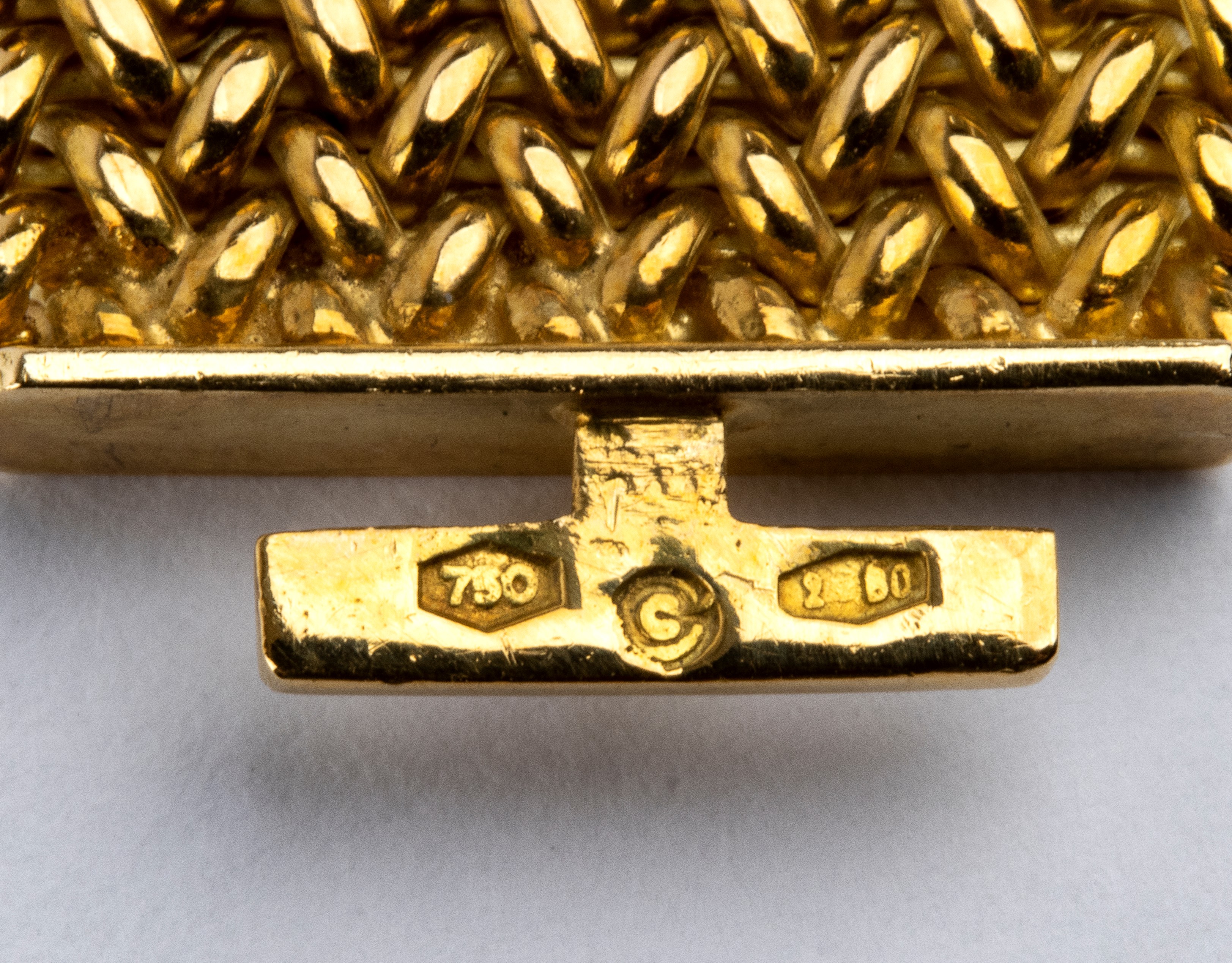 GUIDI ENNIO, Bracciale in oro 18k con diamanti e zaffiri a motivo a nastro