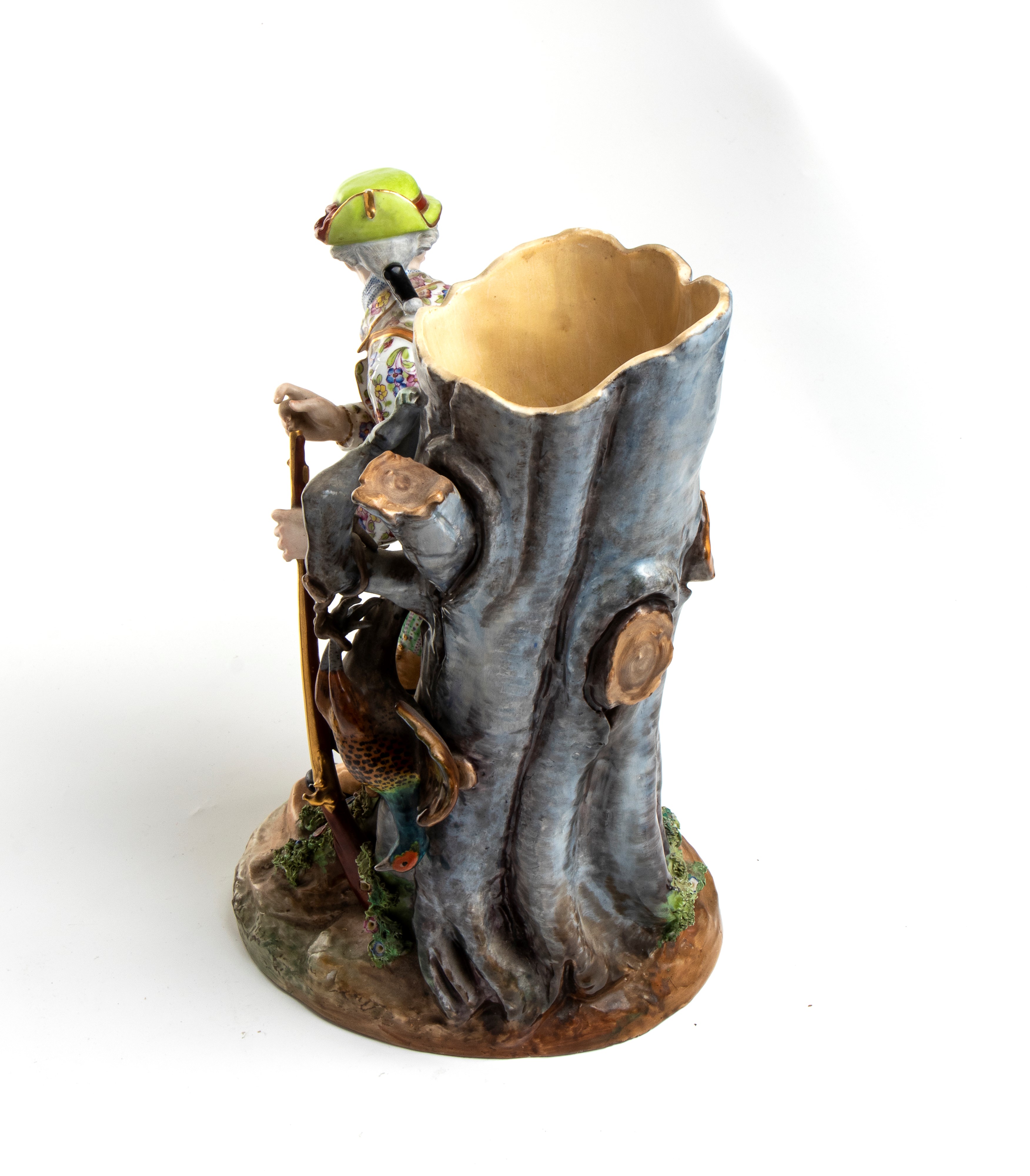 Scultura in porcellana raffigurante un giovane cacciatore