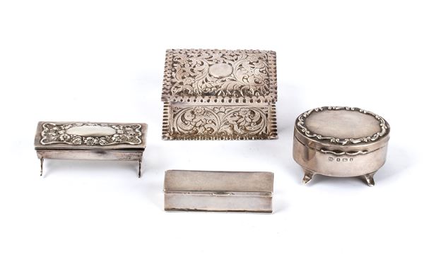 A gropu of four silver boxes