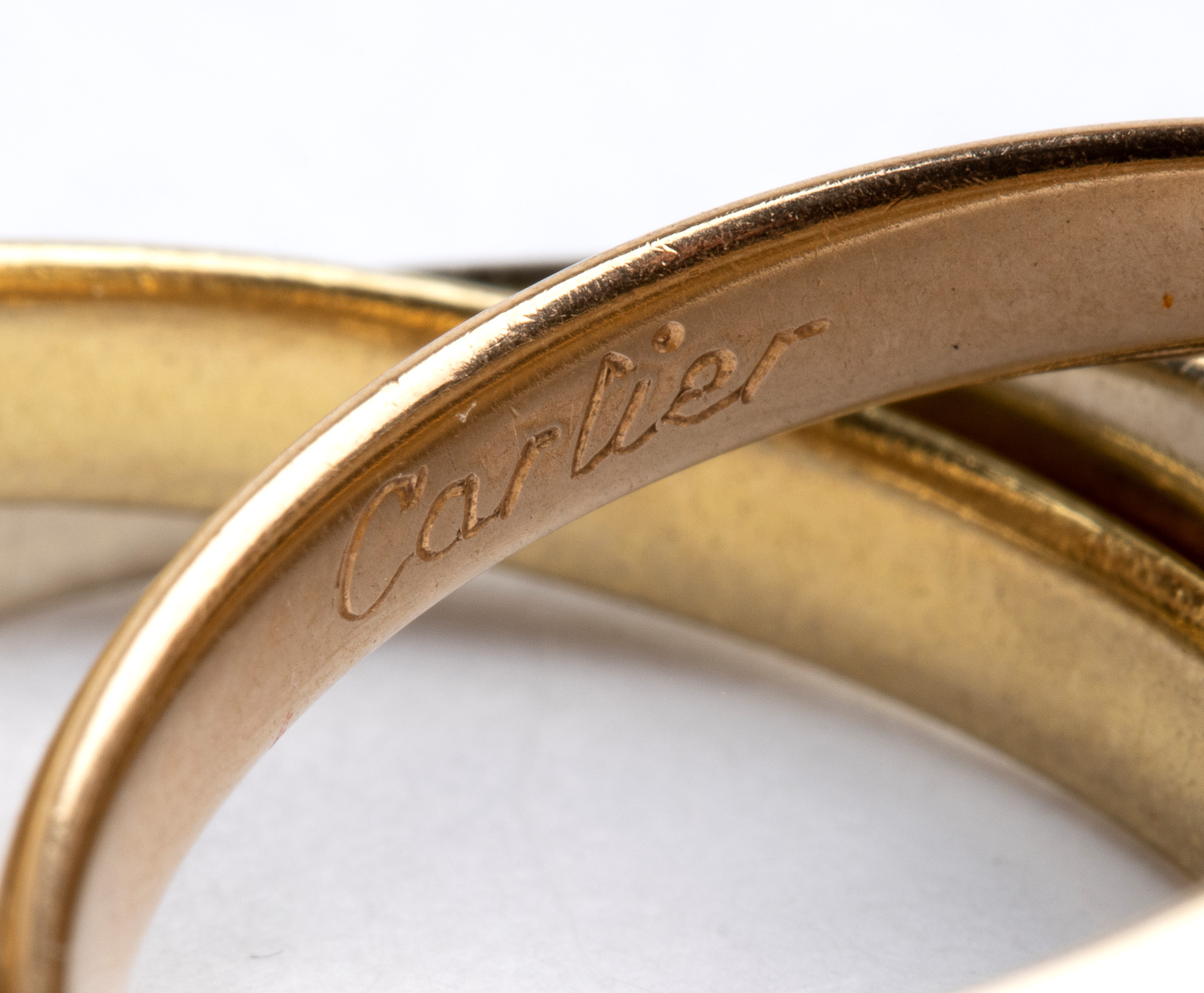 Cartier - Anello a fascia intrecciato in oro giallo, rosa e bianco