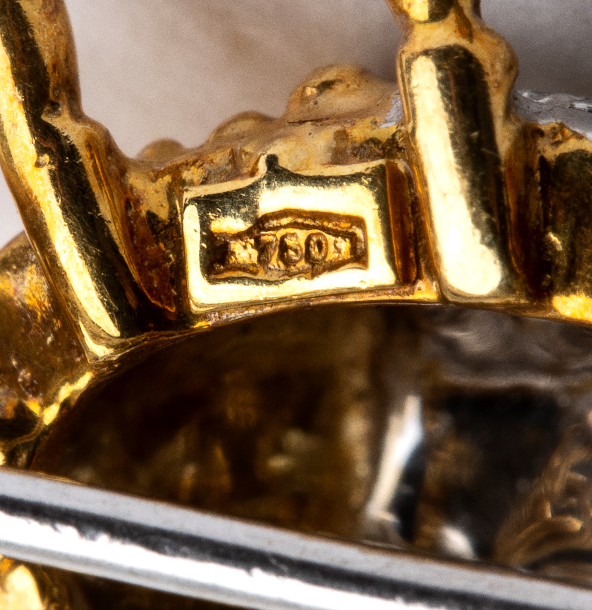 Doppia spilla in oro e diamanti