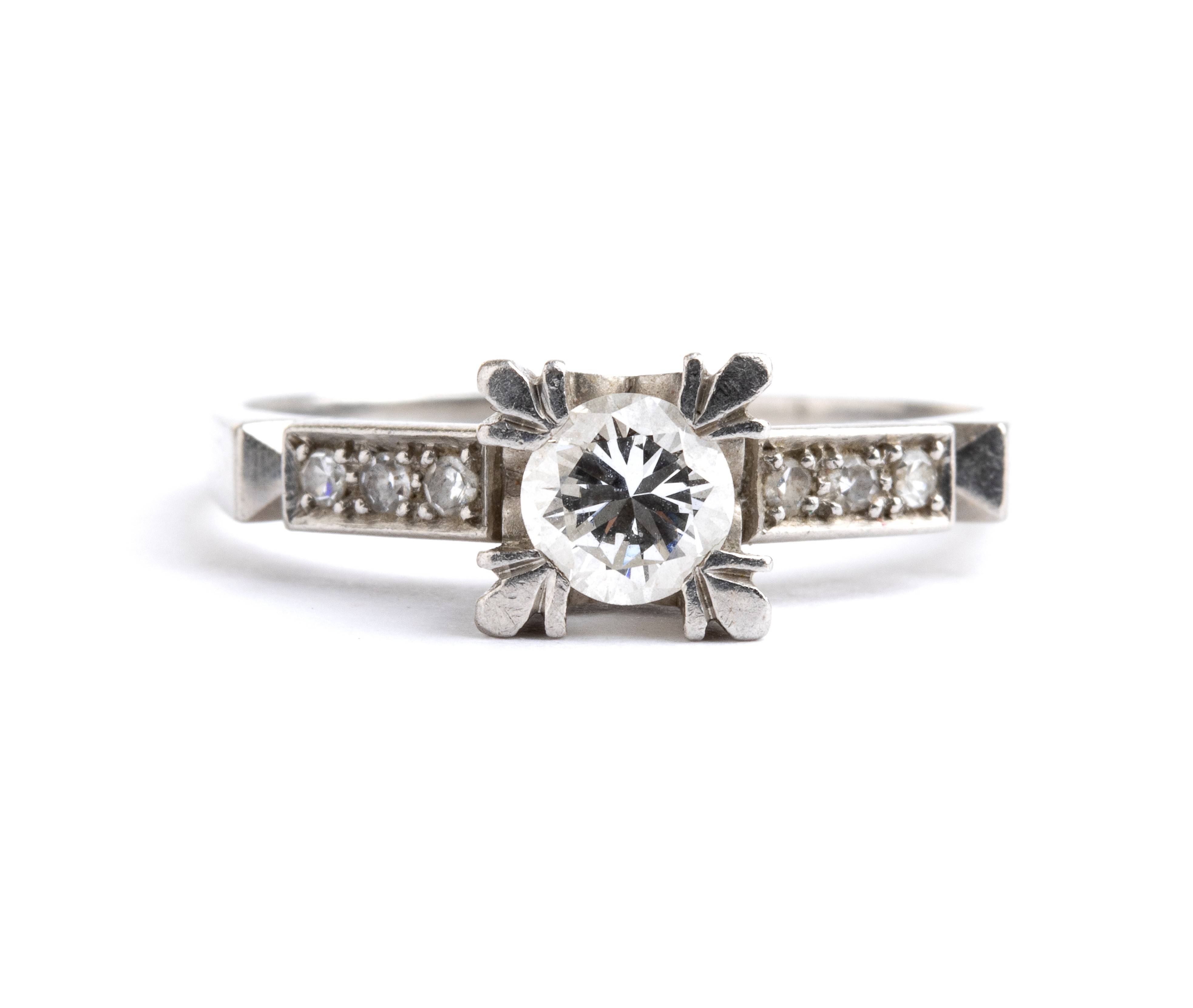 Anello in platino con diamanti (taglio brillante e huit-huit)
