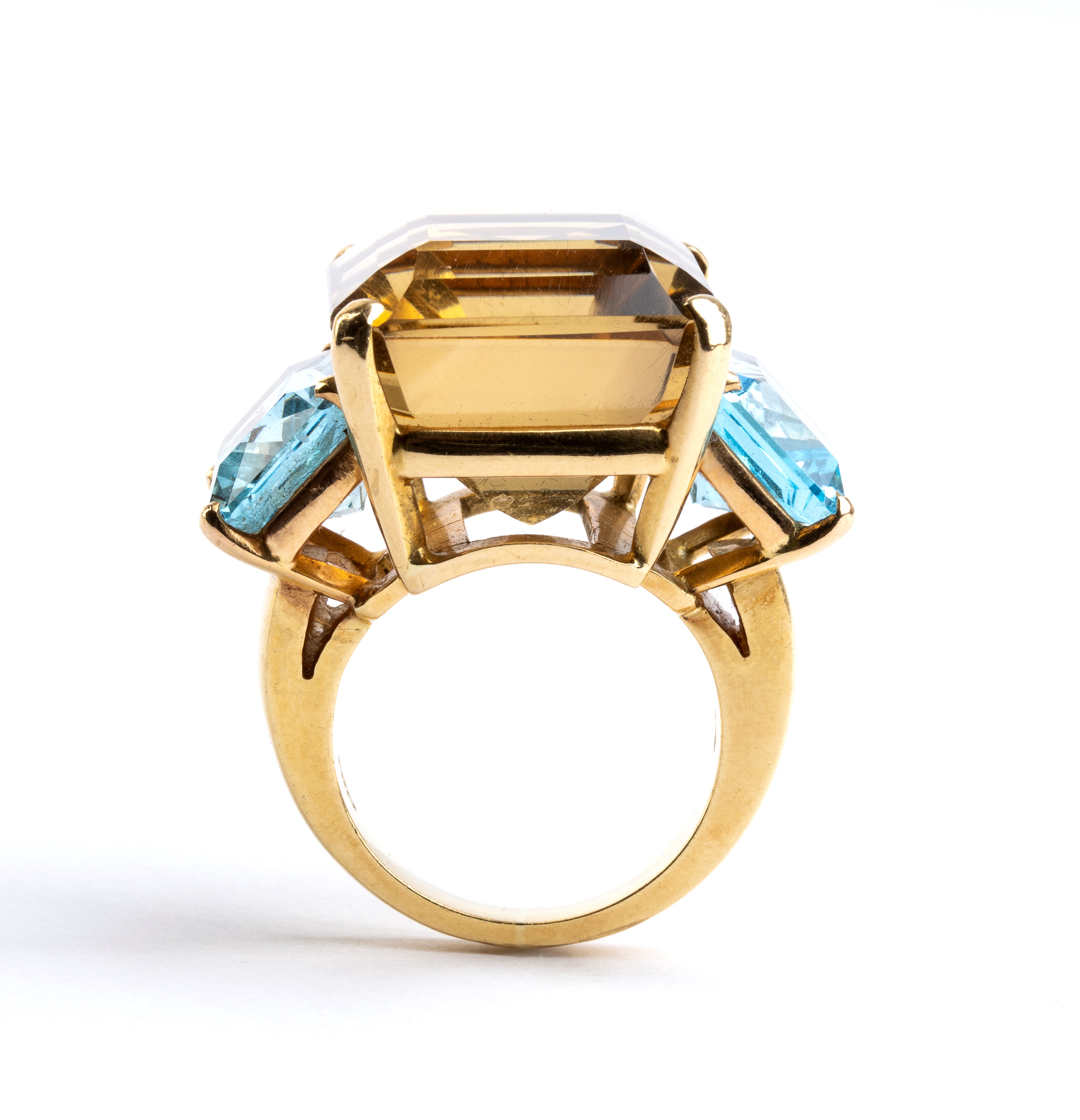 Anello in oro con quarzo citrino e topazi azzurri