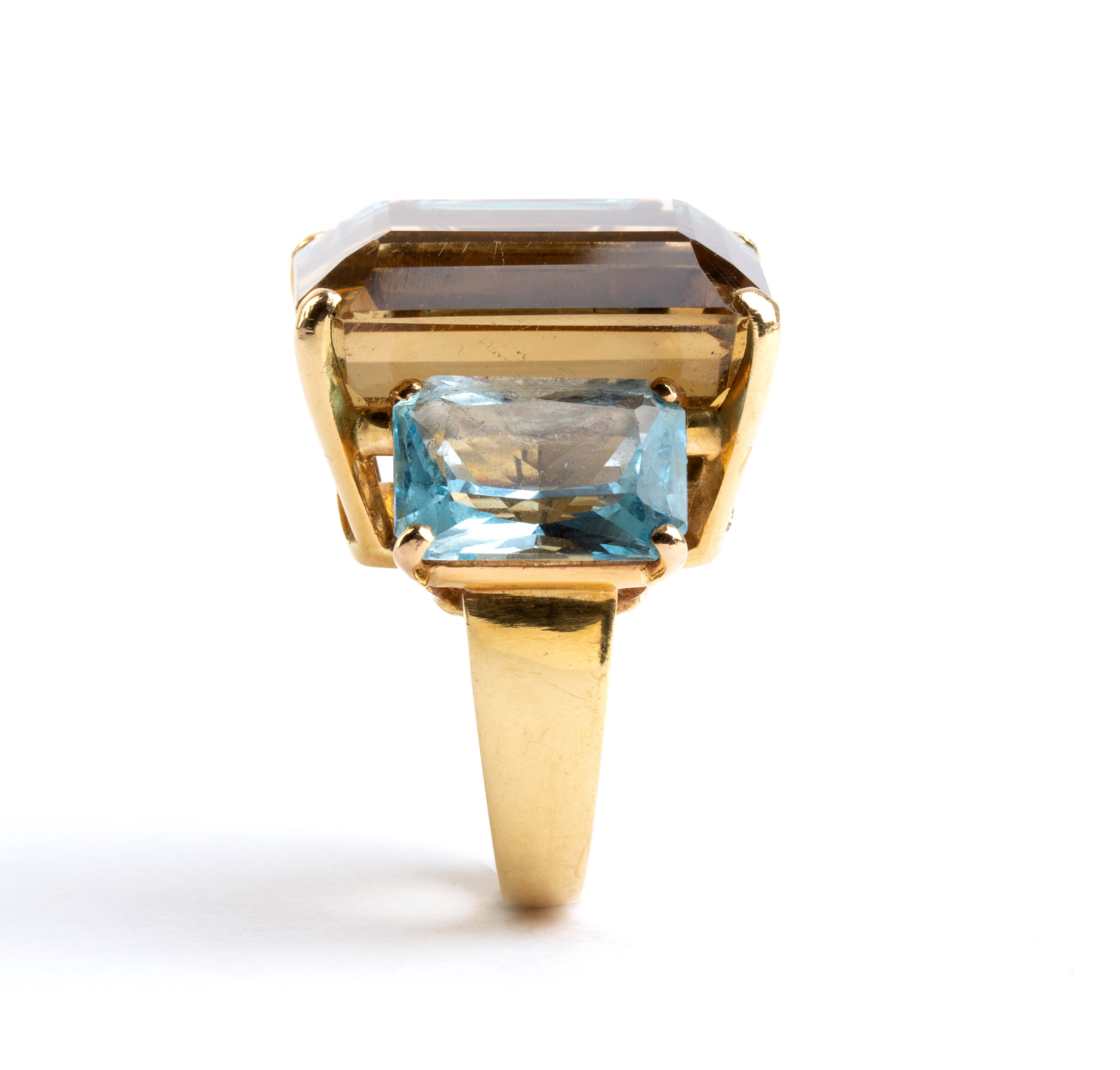 Anello in oro con quarzo citrino e topazi azzurri