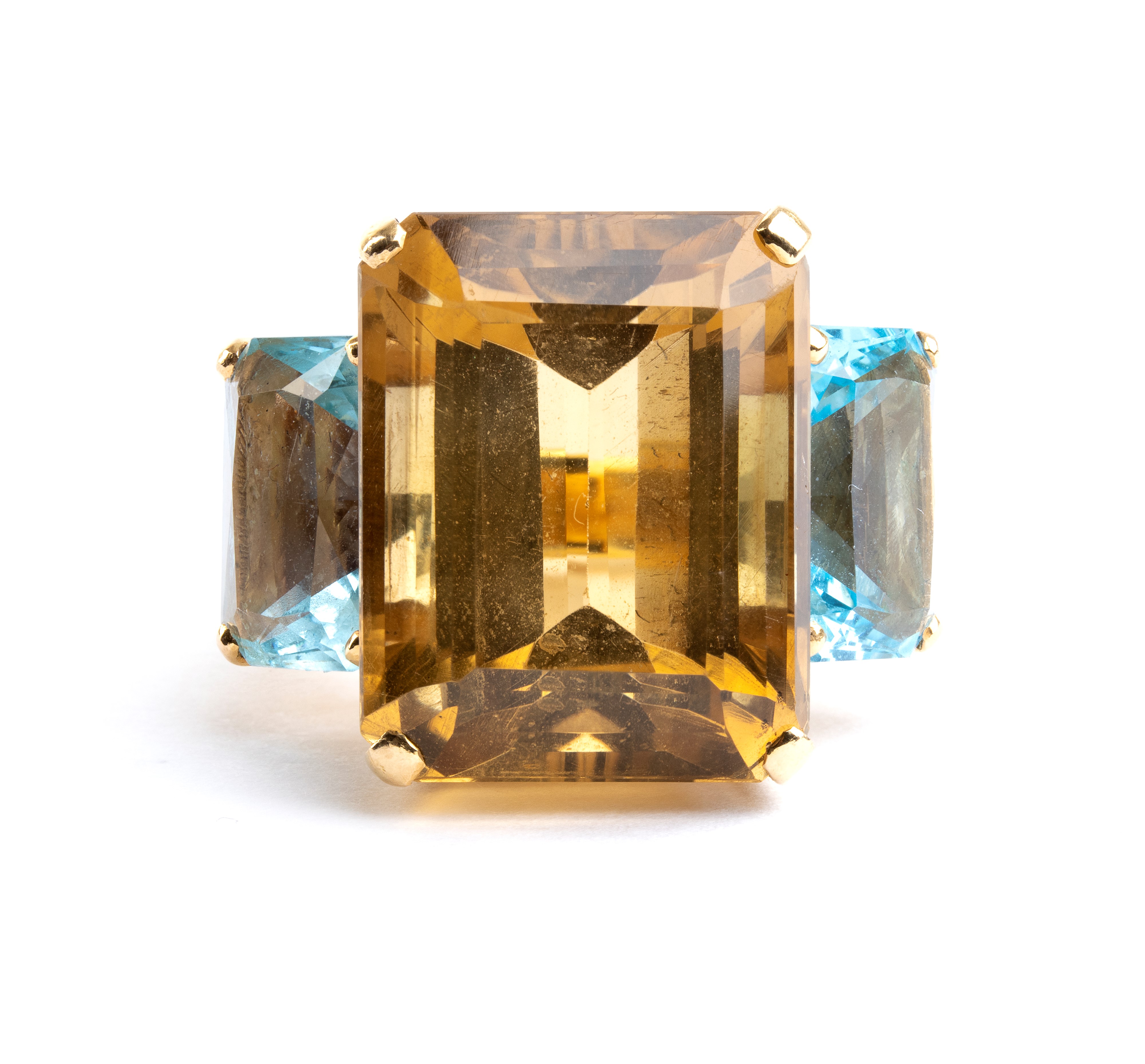 Anello in oro con quarzo citrino e topazi azzurri