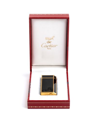 Accendino Must de Cartier in smalto nero, anni ’80