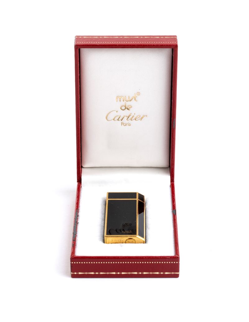 Accendino Must de Cartier in smalto nero, anni ’80