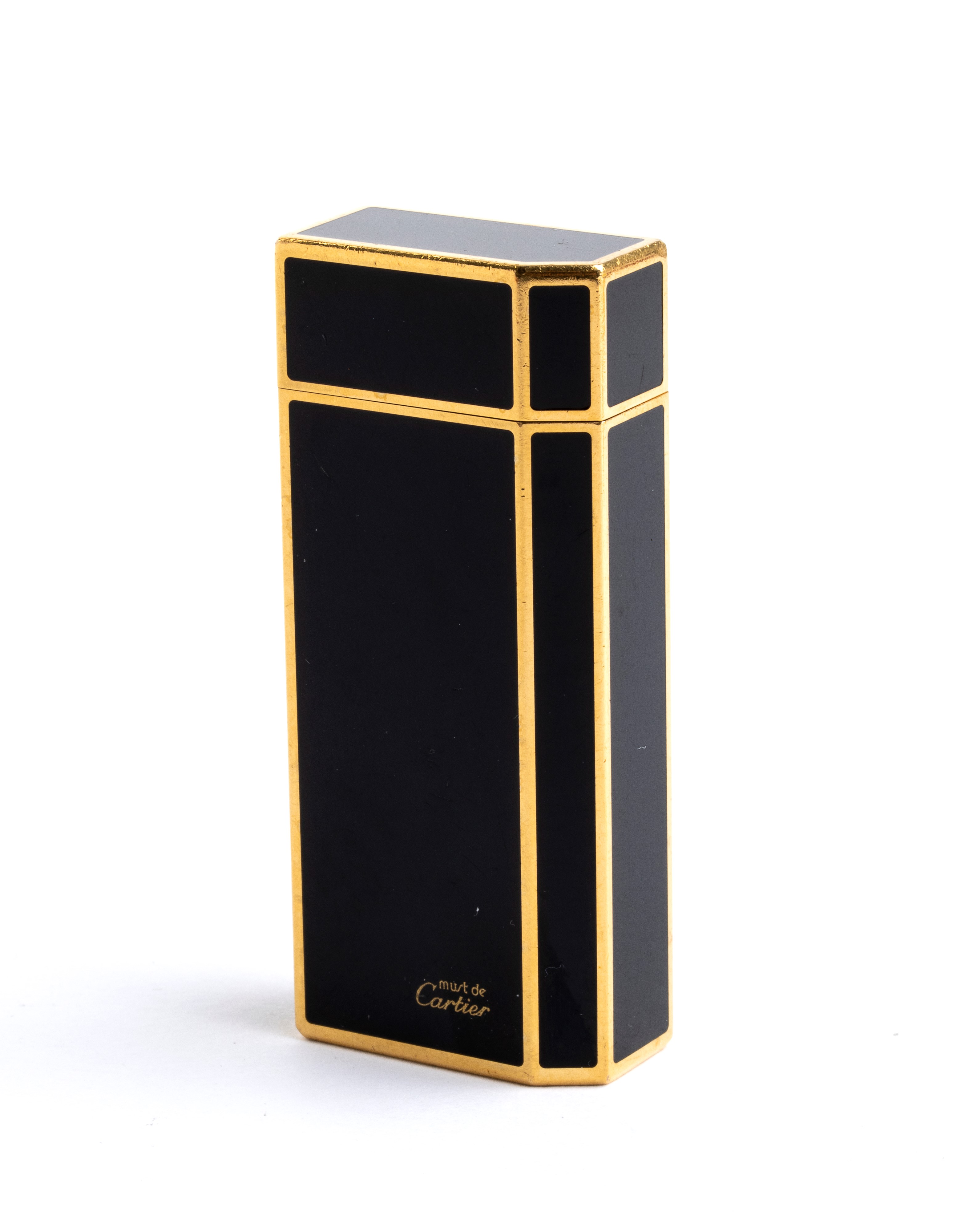 Accendino Must de Cartier in smalto nero, anni ’80