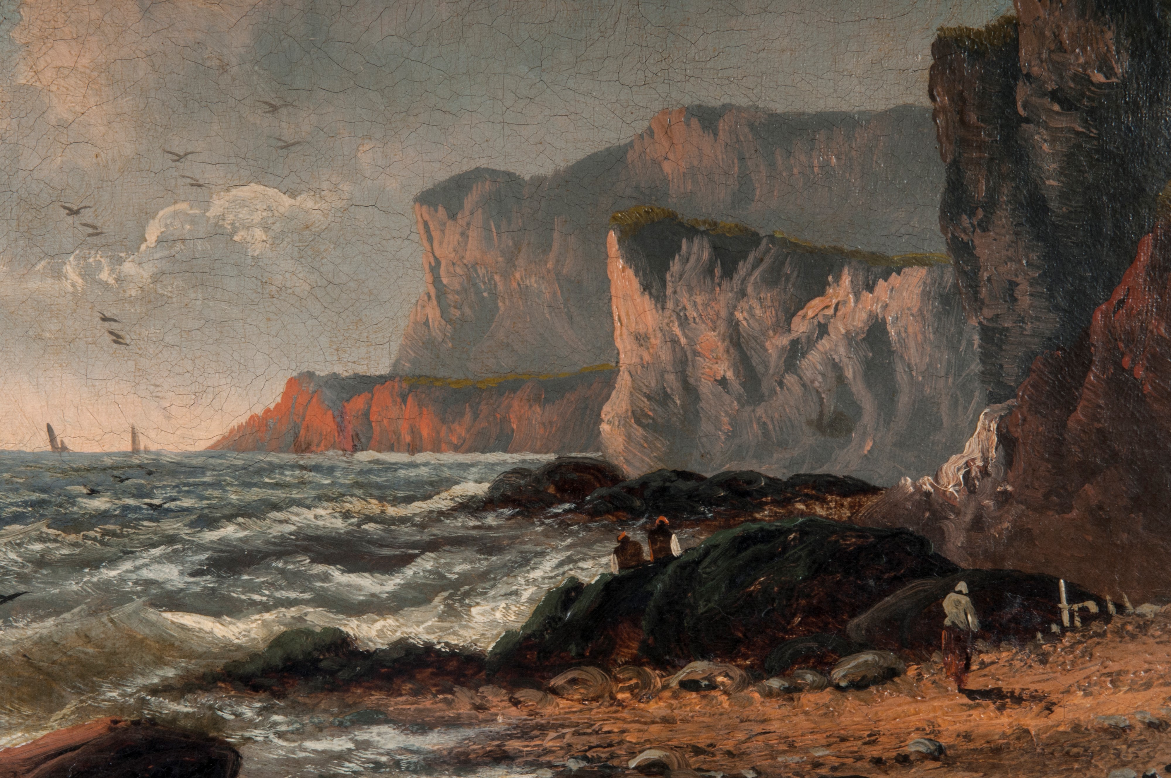 Paesaggio con scogliera e barche