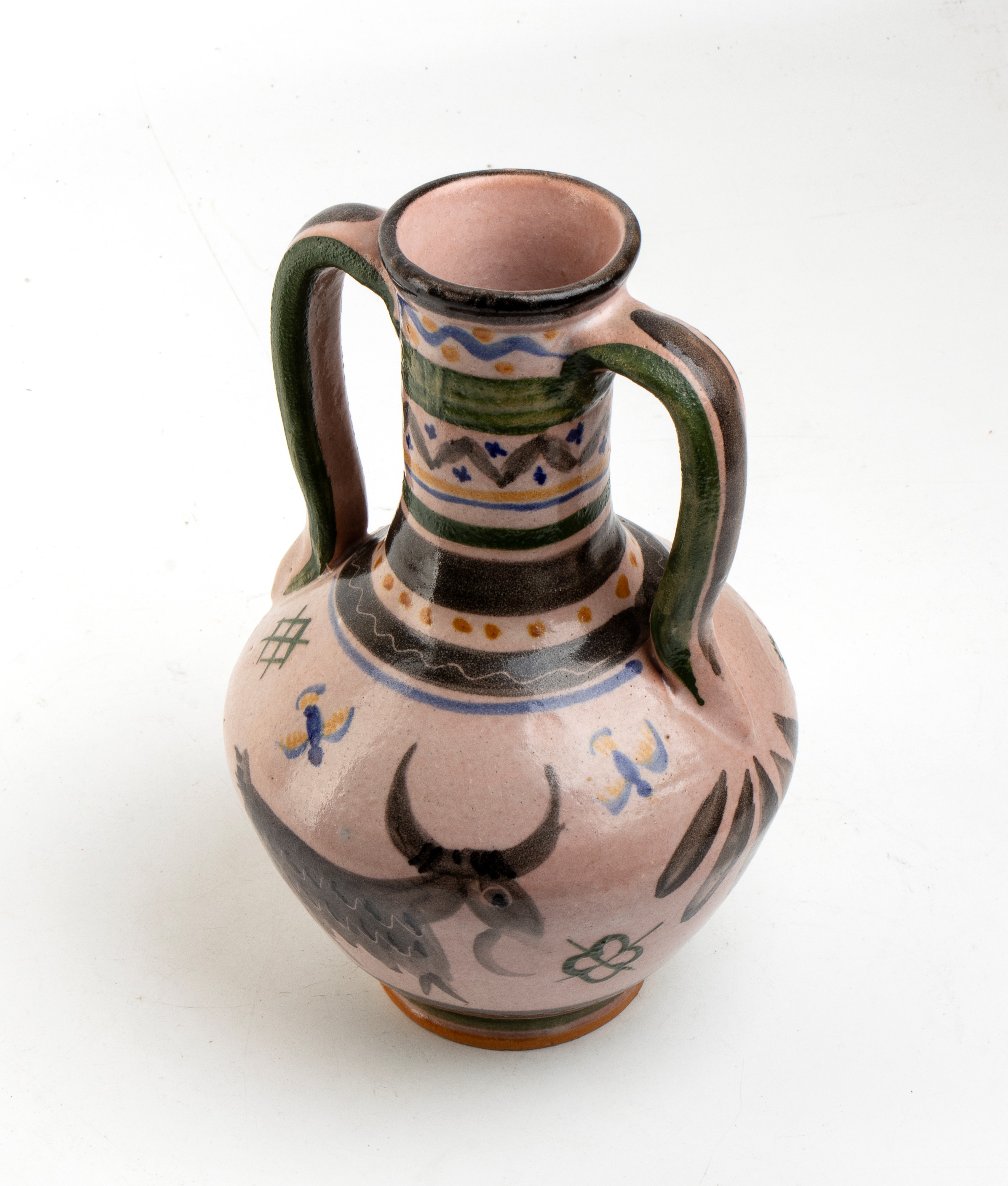 Vaso con decorazioni di caprette