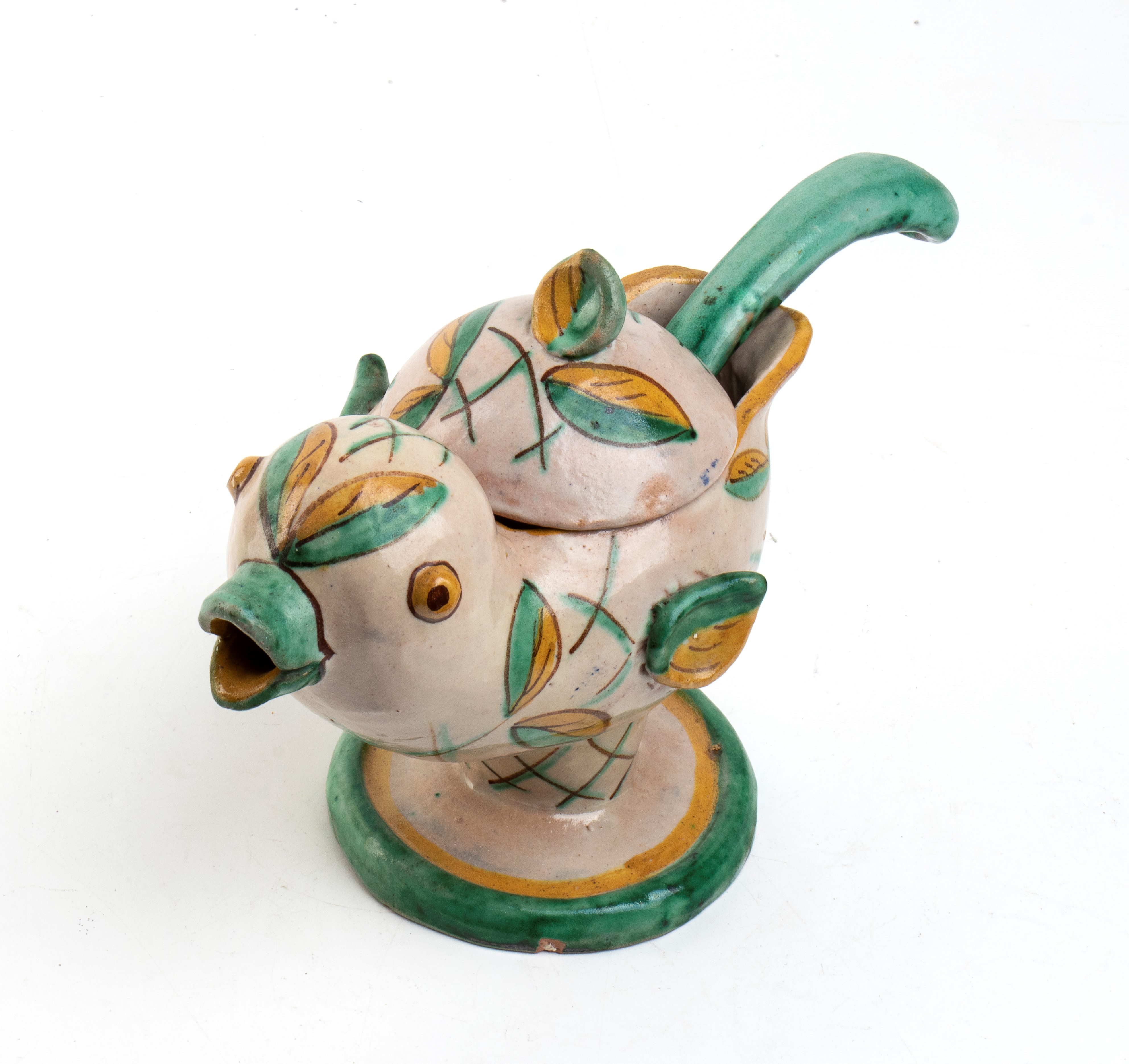 Salsiera a forma di uccellino con piede salvagocce