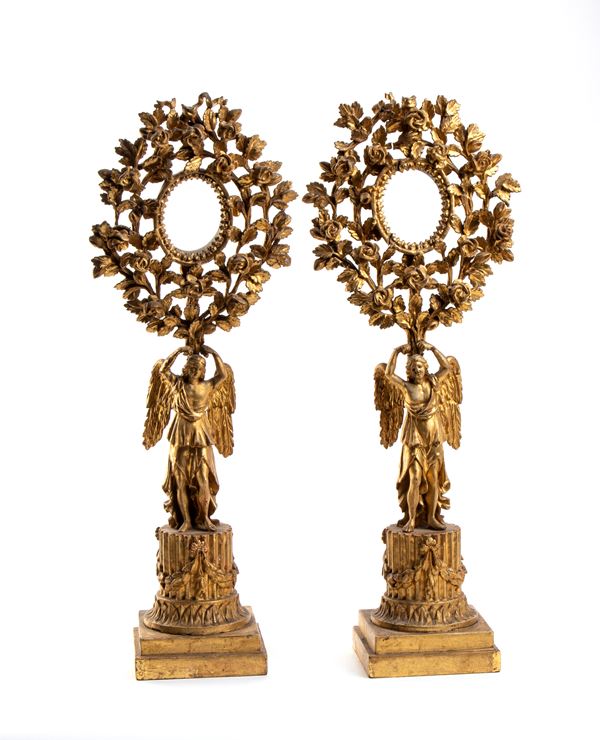 A pair of Italian wooden reliquaries