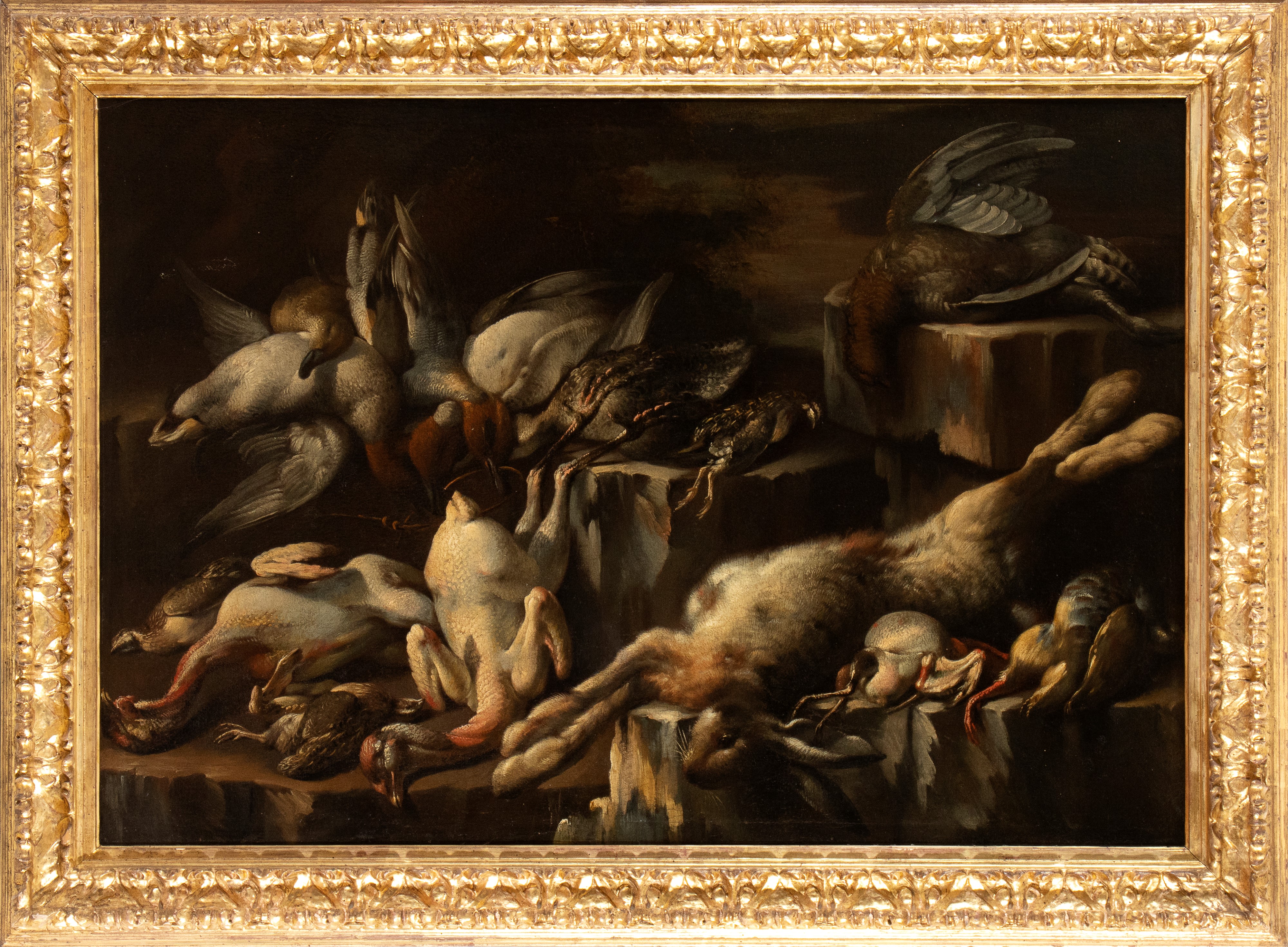 Natura morta con leprotto e caggiagione in un paesaggio