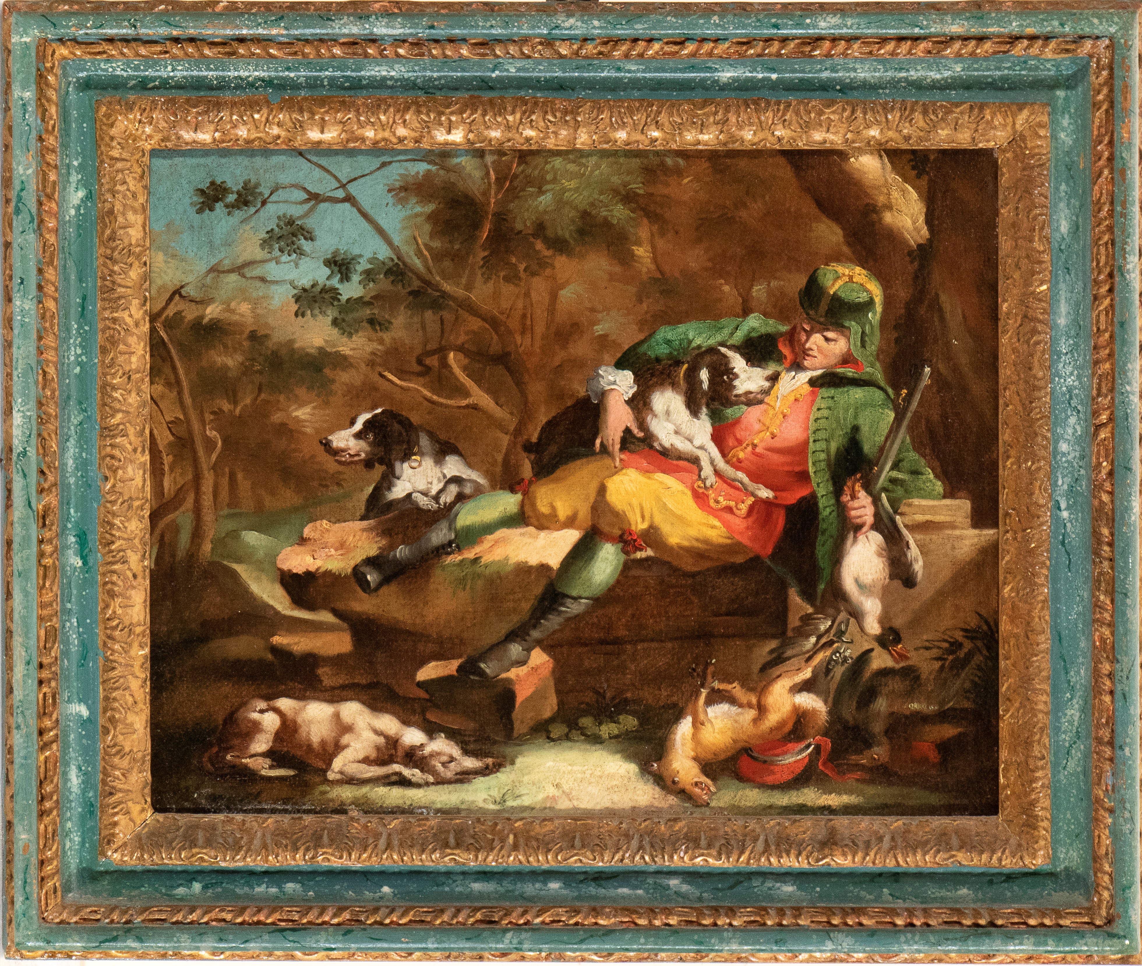 Cacciatore con cani e selvaggina