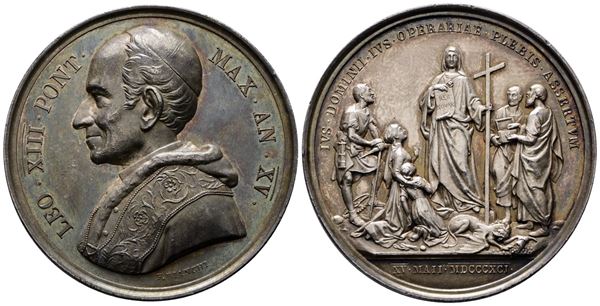 ROMA. Leone XIII (1878-1903). Medaglia 1892 A. XV L'enciclica Rerum Novarum BART.892; Ag; 35,75gr; 43,55mm. Bellissima patina di antica collezione su fondi lucenti.