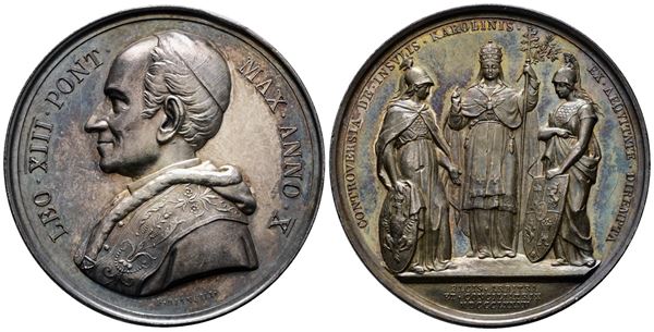 ROMA. Leone XIII (1878-1903). Medaglia 1887 A. X La Chiesa stante tra la Spagna e la Germania. BART.887; Ag; 35,07gr; 43,55mm. Bellissima patina di antica collezione su fondi lucenti. Minimo colpetto al d.