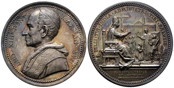 ROMA. Leone XIII (1878-1903). Medaglia 1894 A. XVII Istituzione della prefettura apostolica in India. BART.894; Ag; 35,75gr; 43,55mm. Bellissima patina di antica collezione su fondi lucenti. Colpetto al d.