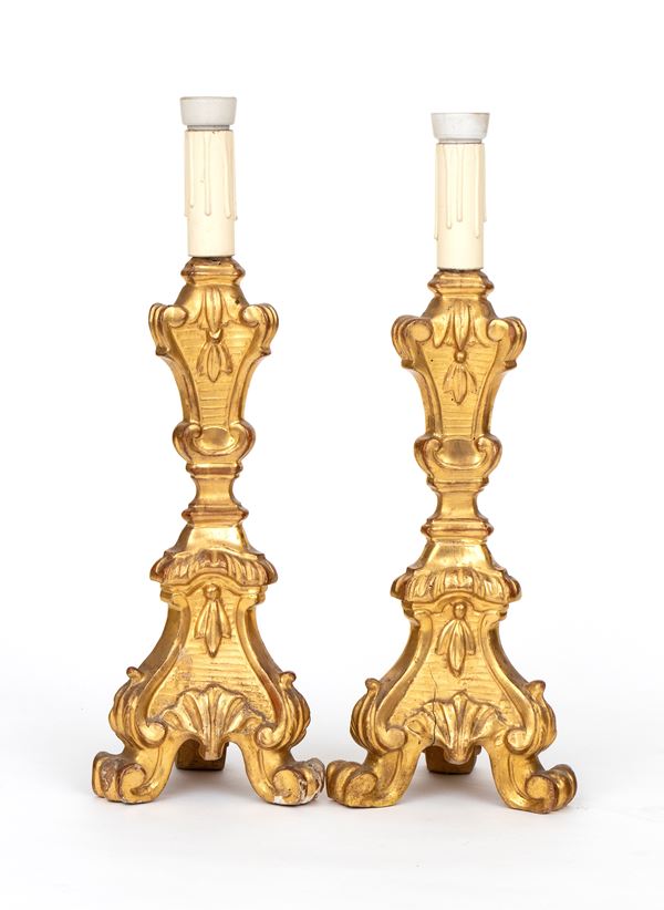 A pair of Italian gilded candelabra
