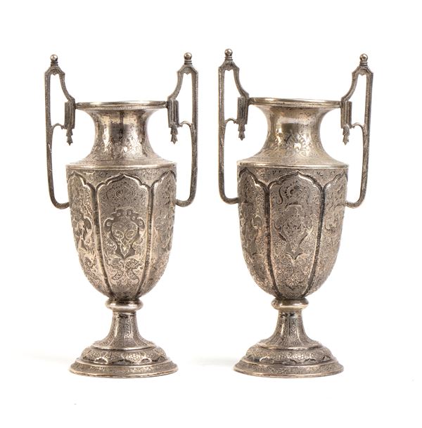A pair of solid silver Indian vases 