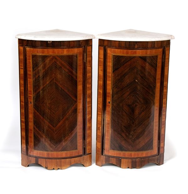 A pair of French Louis XVI cornerboards