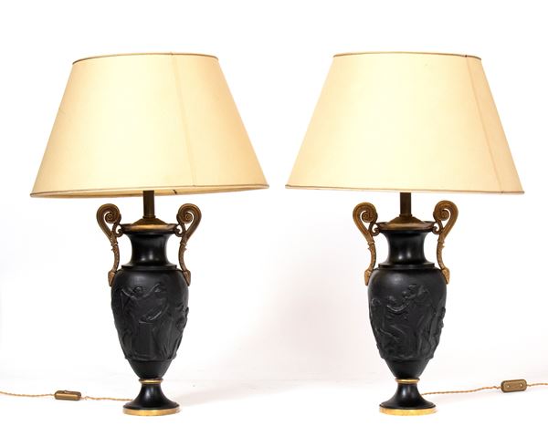 A pair of French bronze lamps