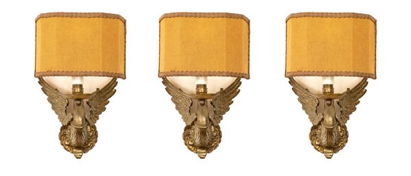 A group of three French bronze wall lamps