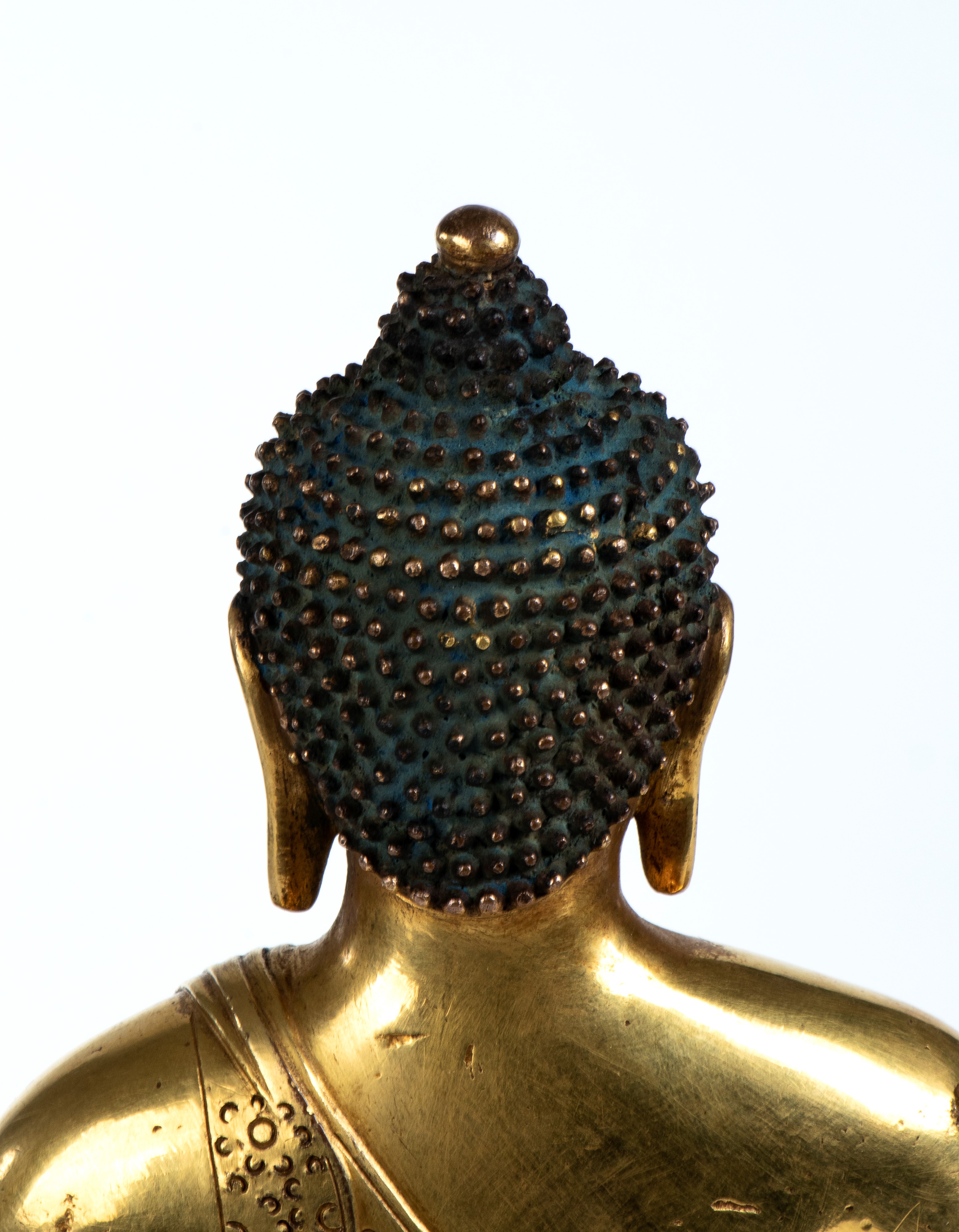 Figura di Buddha in bronzo dorato