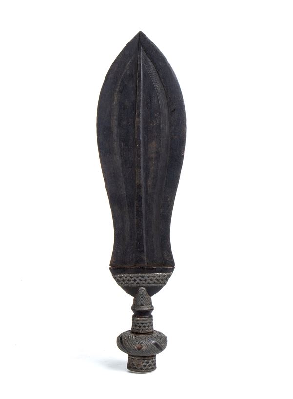 A Kuba Ikul decorated with white metal wires