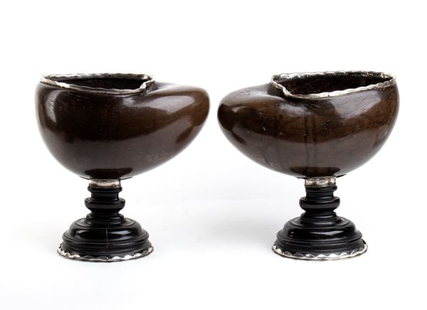 A pair of ornamental cups with coco de mer