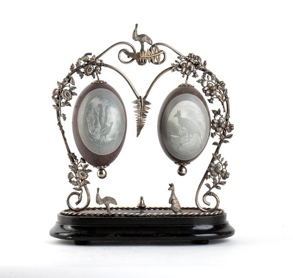 A pair of silver-plated mounted painted Emu eggs