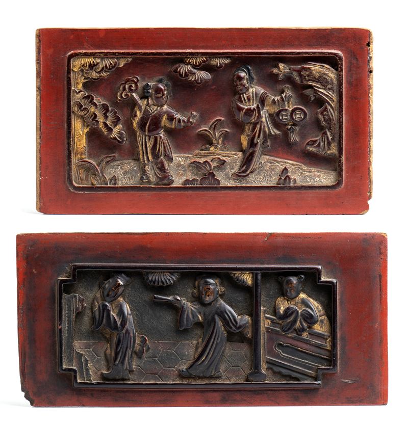 Coppia di elementi ornamentali in legno