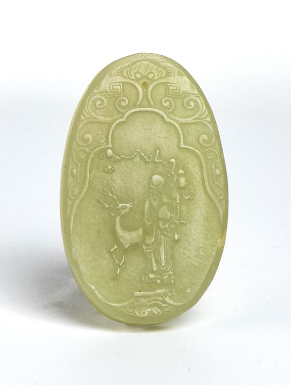 An oval jade plaque