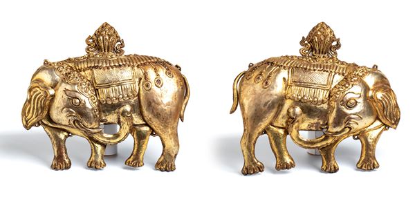 Pair of repoussé embossed copper elephants