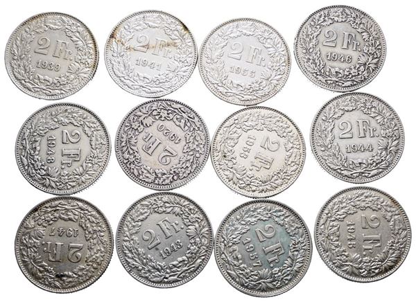 SVIZZERA. Lotto di 12 monete da 2 franchi 1920, 1939, 1941, 1943, 1944, 1945, 1946, 1947, 1948, 1953, 1955, 1957. Conservazioni varie. Ag