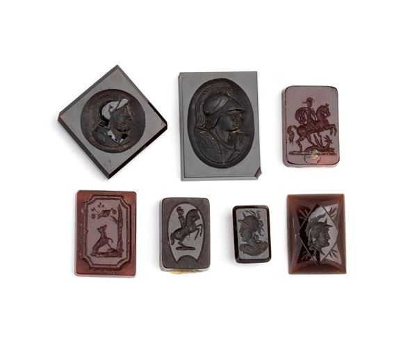 Lot of 7 glass paste carvings