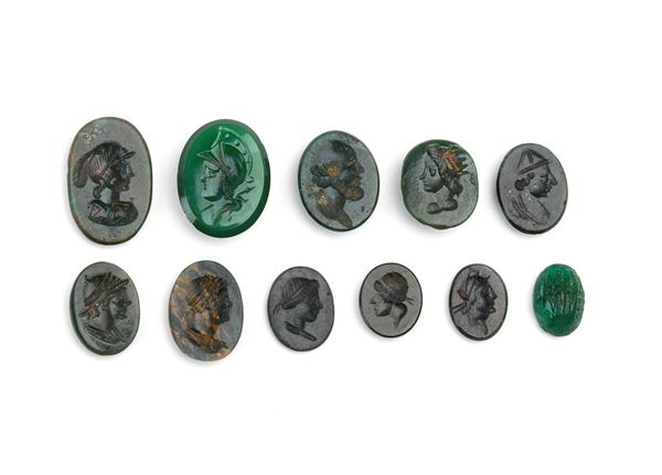 Lot of 10 jasper carvings and one glass paste carving