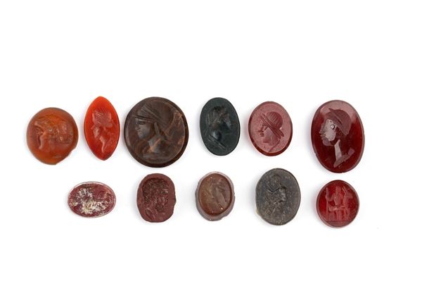 Lot of 10 jasper, carnelian, and glass paste carving