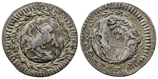 STATO PONTIFICIO. FERRARA. Clemente XI (1700-1721). Grosso da 13 quattrini rimpicciolito ed incastonato in un tondello di una moneta settecemtesca. Ag; 1,49; gr; 20,5mm. Da studio