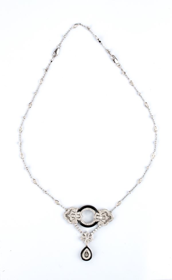 Collier in oro con diamanti e onice