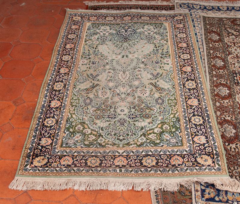 Lotto di sette tappeti, seconda metà XX secolo